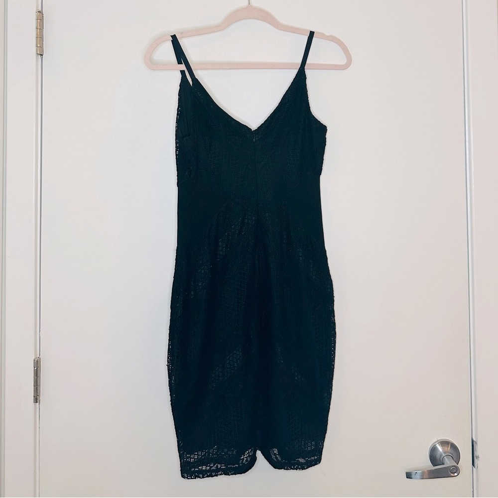Guess bodycon lace dress color black size large L.  LBD little black dress.